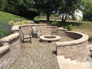 Unwind in Your Backyard with a Cozy Fire Pit carroll landscaping